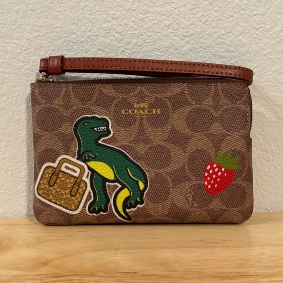 COACH corner zip signature wristlet - dinosaur T-rex - Picture 1 of 3